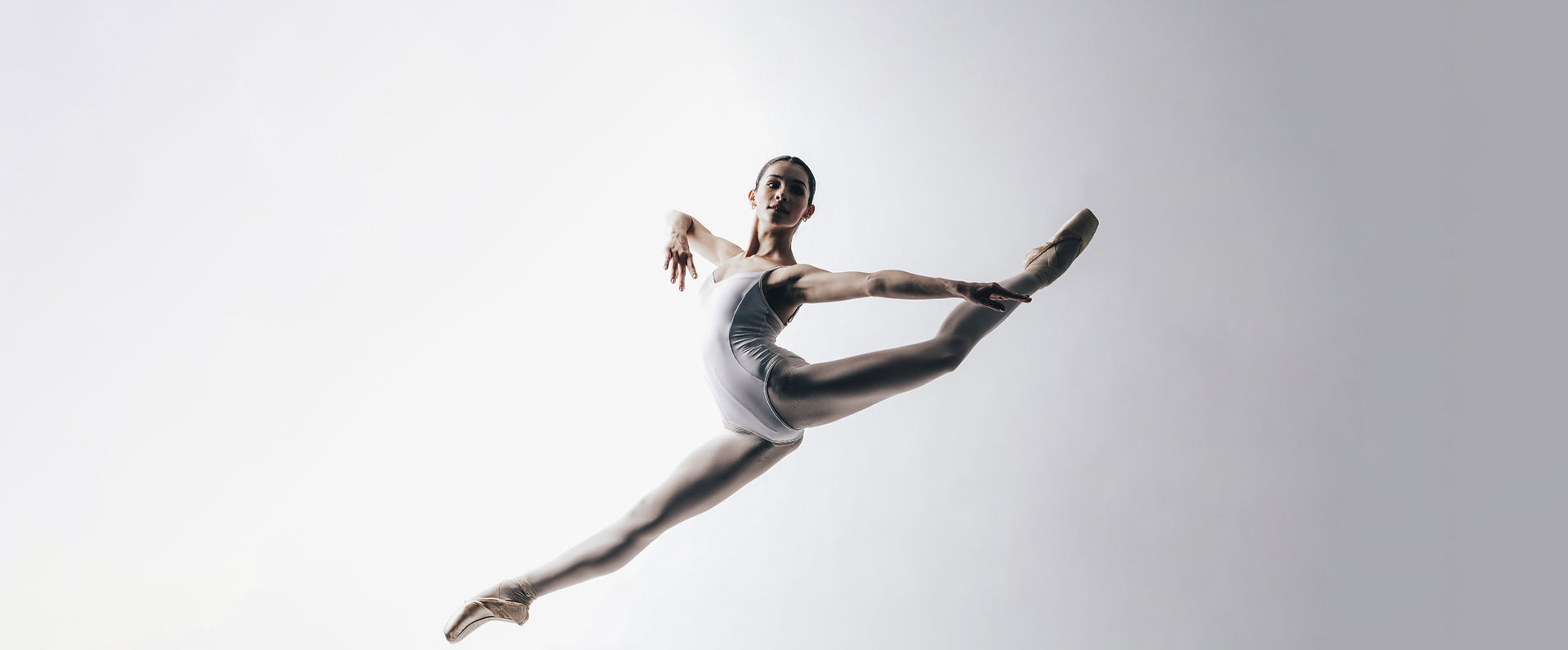 Ballet dancer leaping in a grand jeté